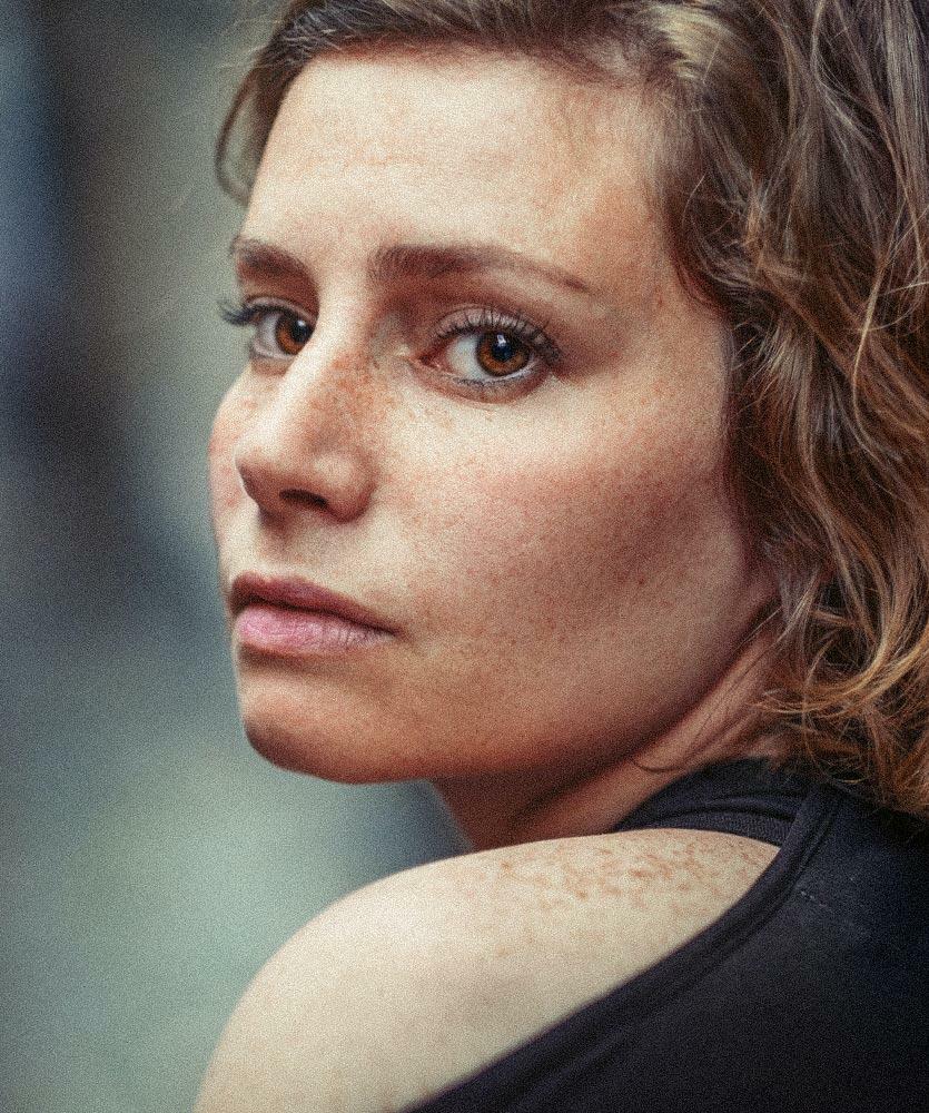 A woman stares with intensity